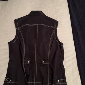 Stretch click collection vest size 10 fits like a 6-8. Navy blue